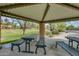 Charming park pavilion with picnic tables for outdoor dining and gatherings in a tranquil setting at 32742 N 15Th Gln, Phoenix, AZ 85085