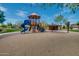 Community playground featuring a slide, climbing structure, swings, and covered picnic area at 32742 N 15Th Gln, Phoenix, AZ 85085