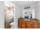 Bathroom with walk-in shower, toilet, and vanity sink at 3500 N Hayden Rd # 2201, Scottsdale, AZ 85251