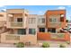 Exterior view of modern apartment complex with a patio and carport at 3500 N Hayden Rd # 2201, Scottsdale, AZ 85251