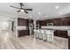 Spacious kitchen featuring a center island, stainless steel appliances, and modern finishes at 3840 W Brogan Ct, New River, AZ 85087