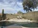 Private backyard oasis with pool and lounging area at 40915 N Columbia Trl, Anthem, AZ 85086