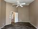 Bright bedroom featuring neutral colors and wood-look floors at 40915 N Columbia Trl, Anthem, AZ 85086