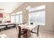 The dining room features ample natural light and space for Gathering gatherings at 40915 N Columbia Trl, Anthem, AZ 85086