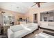 Bright and spacious living room featuring an open floor plan with plenty of natural light at 40915 N Columbia Trl, Anthem, AZ 85086