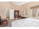 Spacious main bedroom showcasing high ceilings, neutral tones, and ample closet space at 40915 N Columbia Trl, Anthem, AZ 85086