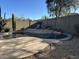 Relaxing pool with tanning deck, desert landscaping and privacy wall at 40915 N Columbia Trl, Anthem, AZ 85086