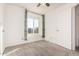 Carpeted bedroom with a large window and window seating area at 4346 E Corral St, Phoenix, AZ 85044