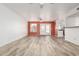 Spacious living room features tile floors, ample natural light, and access to the backyard at 4346 E Corral St, Phoenix, AZ 85044