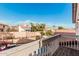 Backyard pool view from patio with red tile roofs and desert plants at 4346 E Corral St, Phoenix, AZ 85044