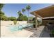 A sparkling community pool with a covered patio is ideal for a refreshing swim and shaded relaxation at 4525 N 66Th St # 55, Scottsdale, AZ 85251