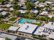 Aerial view of the community, highlighting the pool, green spaces, and well-maintained homes at 4800 N 68Th St # 225, Scottsdale, AZ 85251