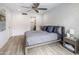 Serene bedroom with a comfortable bed, a modern ceiling fan, and access to a bathroom at 4800 N 68Th St # 225, Scottsdale, AZ 85251