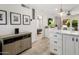 Cozy living area with hardwood floors, adjacent to the kitchen and views of the patio at 4800 N 68Th St # 225, Scottsdale, AZ 85251