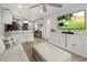 Open-concept living space featuring a kitchen, living room, and stylish decor with a comfortable sofa at 4800 N 68Th St # 225, Scottsdale, AZ 85251