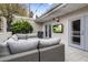 Inviting outdoor patio with comfortable seating, TV, and string lights, perfect for entertaining at 4800 N 68Th St # 225, Scottsdale, AZ 85251