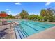 Refreshing community pool with lounge chairs, offering a perfect spot to relax and enjoy the sun at 4800 N 68Th St # 225, Scottsdale, AZ 85251