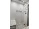 Modern shower with white subway tile, built-in shelf, and a comfortable marble bench at 4800 N 68Th St # 225, Scottsdale, AZ 85251