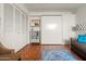 Office space showcasing closet doors, tile flooring and comfortable sofa and chairs at 5139 N 76Th Pl, Scottsdale, AZ 85250