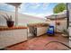 Private backyard patio featuring brick flooring, stucco walls, and comfortable outdoor seating at 5139 N 76Th Pl, Scottsdale, AZ 85250
