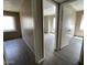 A secondary bedroom with light gray wood-look floors at 5420 W Lynwood St, Phoenix, AZ 85043