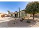 Well maintained single-story home features xeriscaping at 583 W Bismark St, San Tan Valley, AZ 85143