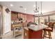 Spacious kitchen featuring an island, stainless steel appliances, breakfast bar seating, and a gas range at 583 W Bismark St, San Tan Valley, AZ 85143