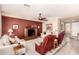 Comfortable living room with plush seating, a ceiling fan, and neutral décor at 583 W Bismark St, San Tan Valley, AZ 85143