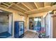 Private back patio with a storage refrigerator, outdoor seating and direct access to indoor spaces at 5962 W Townley Ave, Glendale, AZ 85302