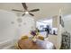 Dining area featuring a wood table and a partial view of the kitchen at 5962 W Townley Ave, Glendale, AZ 85302