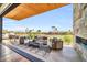 Spacious outdoor balcony featuring a seating area and views of the golf course at 6331 E Phoenician Blvd # 6, Scottsdale, AZ 85251