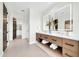 This bright bathroom includes double vanity, well-lit mirrors, and modern fixtures at 6331 E Phoenician Blvd # 6, Scottsdale, AZ 85251