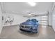 Spacious garage featuring a modern car and epoxy flooring at 6331 E Phoenician Blvd # 6, Scottsdale, AZ 85251