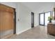 Hallway with a lift, light walls, and tile floor at 6331 E Phoenician Blvd # 6, Scottsdale, AZ 85251