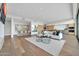 An open-concept living space boasting hardwood floors, and a large kitchen and dining area at 6331 E Phoenician Blvd # 6, Scottsdale, AZ 85251