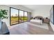 This main bedroom offers balcony access with golf course views at 6331 E Phoenician Blvd # 6, Scottsdale, AZ 85251