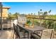 Inviting outdoor kitchen and dining area with stainless steel grill and a view of the golf course at 6331 E Phoenician Blvd # 6, Scottsdale, AZ 85251