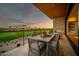 Inviting patio with outdoor dining and seating overlooking a lush golf course view at 6331 E Phoenician Blvd # 6, Scottsdale, AZ 85251
