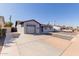 Charming home featuring a driveway and decorative gravel with a walkway to the front door at 7807 E Palm Ln, Scottsdale, AZ 85257