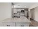 Updated kitchen boasts stainless steel appliances, granite countertops and ample cabinet space at 7807 E Palm Ln, Scottsdale, AZ 85257