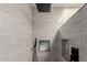 Contemporary shower with sleek fixtures, tiled walls, and built-in niche at 7807 E Palm Ln, Scottsdale, AZ 85257