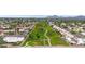 Aerial view of neighborhood with green belt; a verdant community, perfect for outdoor walks at 9621 N 83Rd Way, Scottsdale, AZ 85258