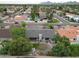 An aerial view of the home showcasing its mature trees and proximity to neighborhood amenities at 9621 N 83Rd Way, Scottsdale, AZ 85258