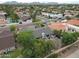 An aerial of the property highlighting its lush landscaping and convenient location within the neighborhood at 9621 N 83Rd Way, Scottsdale, AZ 85258