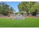 A built-in hot tub area and manicured lawn creates a relaxing outdoor oasis at 9621 N 83Rd Way, Scottsdale, AZ 85258