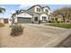 Lovely home with large driveway and basketball hoop at 9712 E Tangerine Rd, Florence, AZ 85132