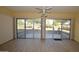 Bright and open living room with a view of backyard and a sliding glass door at 10334 W Highwood Ln, Sun City, AZ 85373