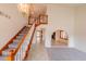 Bright foyer featuring an elegant staircase, high ceilings, and an open floor plan at 10421 N 77Th Pl, Scottsdale, AZ 85258