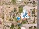 Desert home featuring solar panels and a private swimming pool at 10955 E Vista Del Cielo Rd, Gold Canyon, AZ 85118