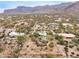 Desert home with a pool, solar panels, and mountain views at 10955 E Vista Del Cielo Rd, Gold Canyon, AZ 85118